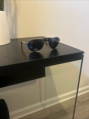 Cartier Silver Frame Sunglasses with Black Lenses and Brown Temples
